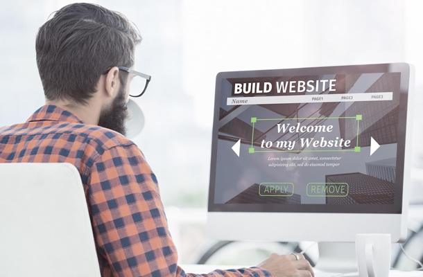 man designing and coding a website from Domains Priced Best